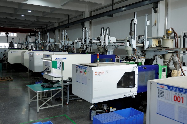 Injection molding machines producing plastic parts in-house